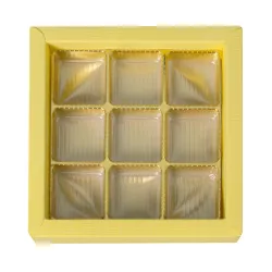 box of 9 chocolates yellow with transparent lid