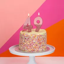 Candela numero 4 con oro rosa e glitter rosa