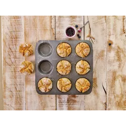 Perforated bread roll baking tray with non-stick coating