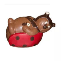 Chocolate mold ladybug lying down