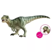 T-Rex play figure as a cake topper