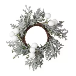 4 ronds de serviettes en feuillage de Noël avec baies