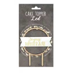 Topper led "Joyeux Anniversaire" in wood