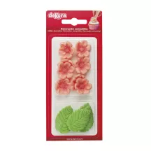 Fleurs roses et feuilles vertes en sucre