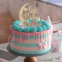 Schleife rosa und Blumen aus Zucker