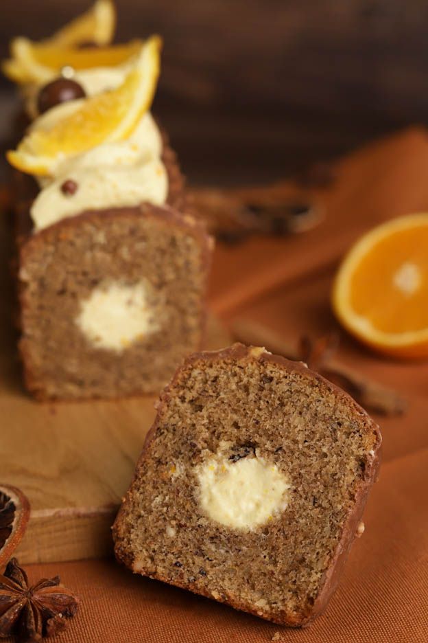 Sliced orange gingerbread cake with orange ganache and Rocher icing