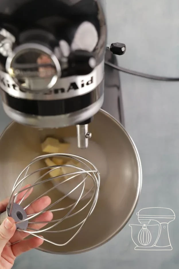 Butter and sugar in the mixer's Mixing bowl · Butter-sugar mixture being beaten fluffy · Pale, fluffy butter-sugar mixture after five minutes
