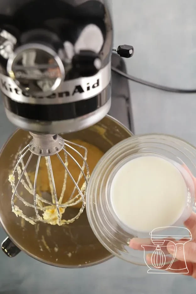 Milk poured into the batter · Baking powder measured with the Measuring spoon · Flour sifted over the batter
