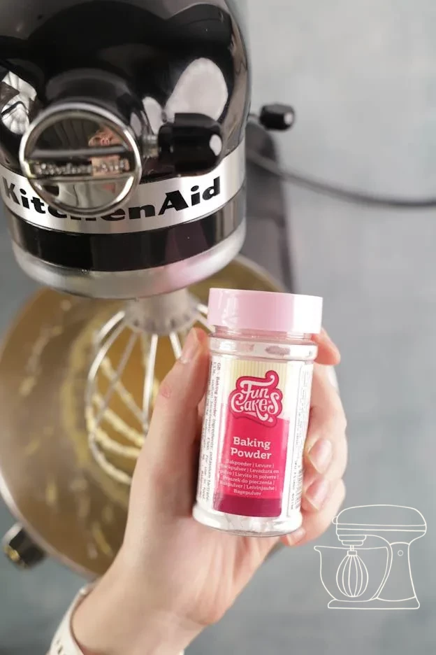Milk poured into the batter · Baking powder measured with the Measuring spoon · Flour sifted over the batter