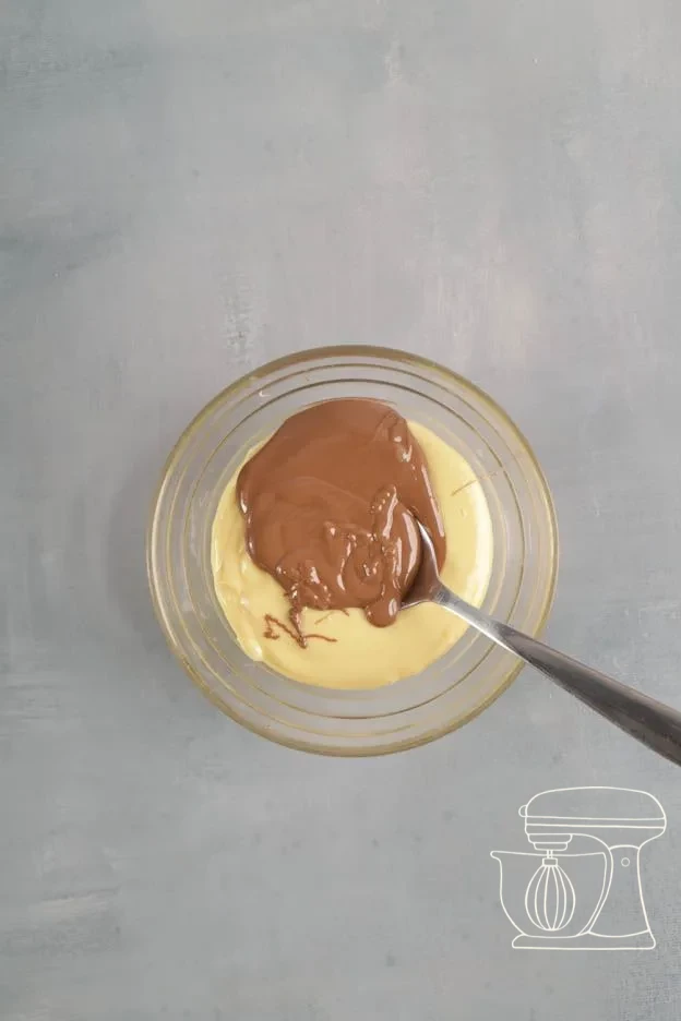 Milk chocolate being melted and stirred · Melted Milk chocolate added to the second Bowl · Medium-brown batter with Milk chocolate