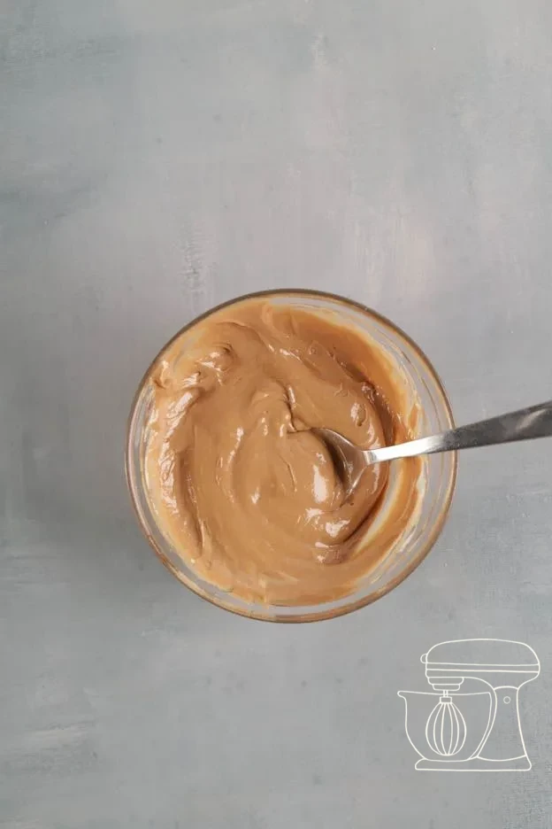 Milk chocolate being melted and stirred · Melted Milk chocolate added to the second Bowl · Medium-brown batter with Milk chocolate