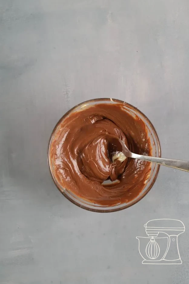 Dark chocolate melting in the Bowl · Dark chocolate stirred into the third batter · Three cake batters in white, light and dark brown side by side
