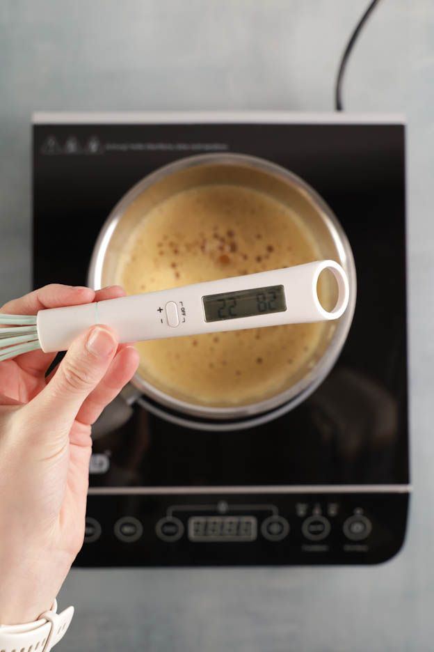 Heating the caramel and eggs to 82°C