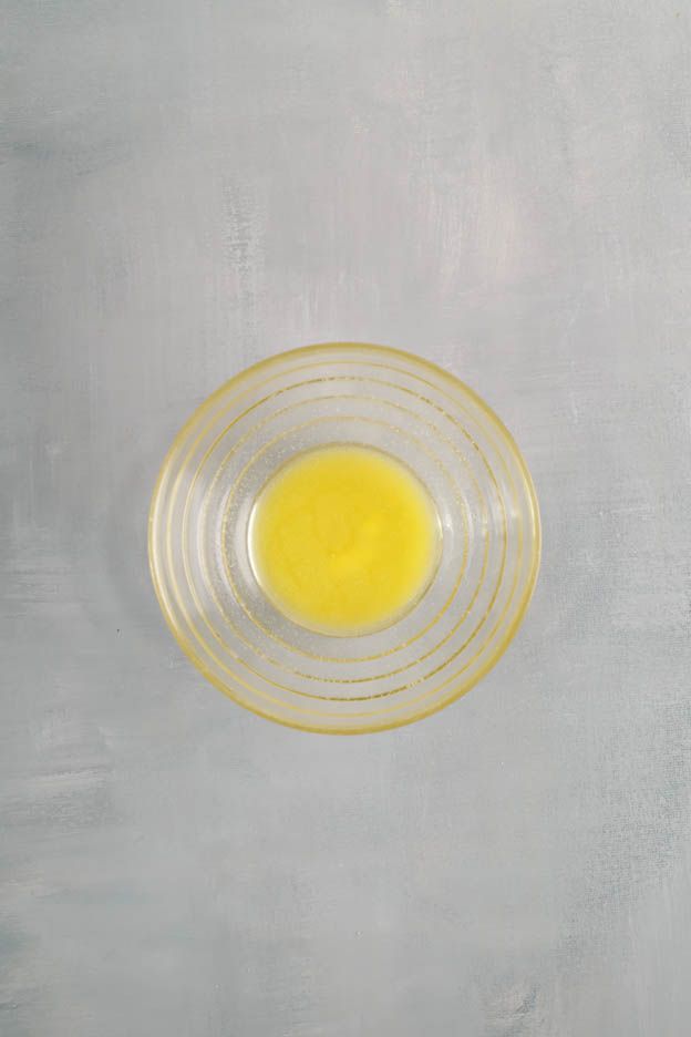 Mixture of sugar and beaten egg yolks in a bowl