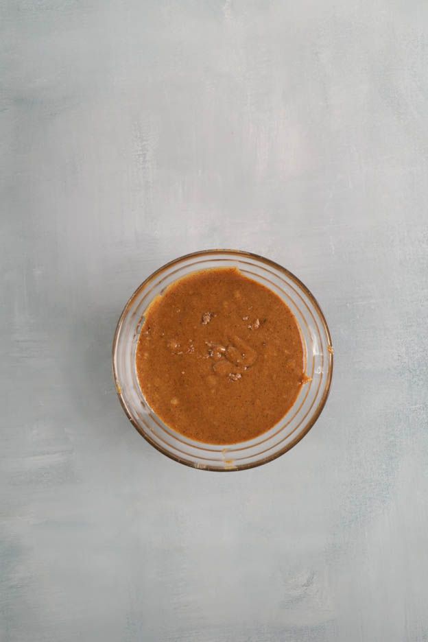 Praline being assembled on the caramel insert