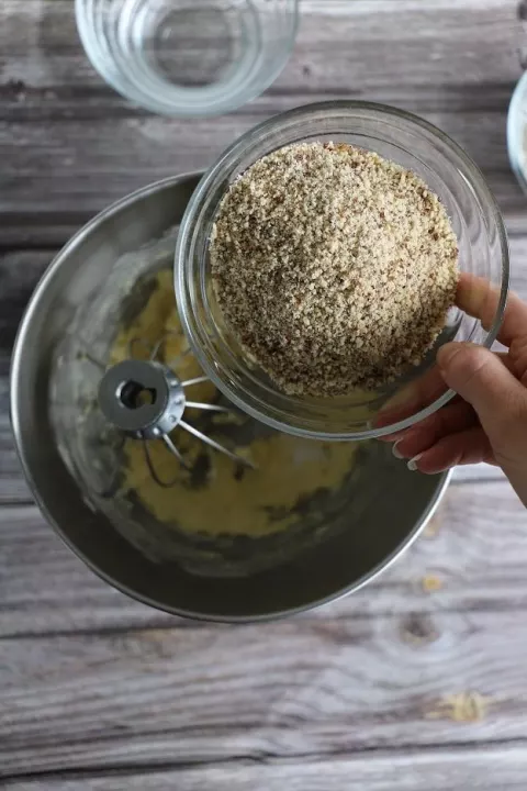 Ground hazelnuts being added