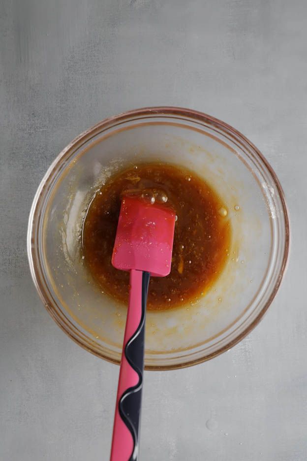 Liquid honey being added