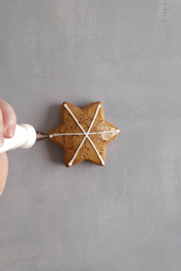 Gingerbread being decorated with royal icing