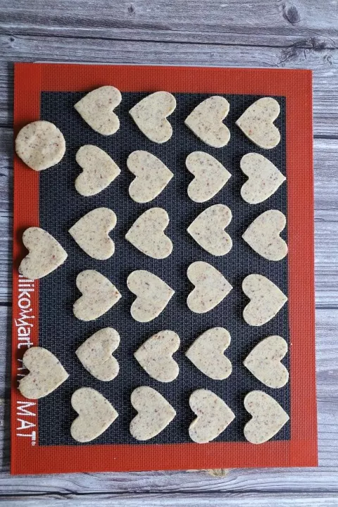Cut-out hearts on the perforated mat