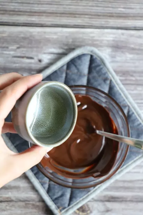 The chocolate is stirred