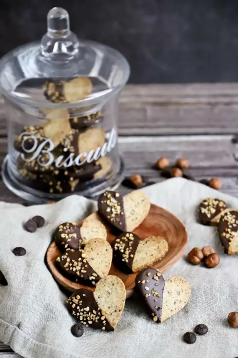 Close-up of a hazelnut cookie with a chocolate edge