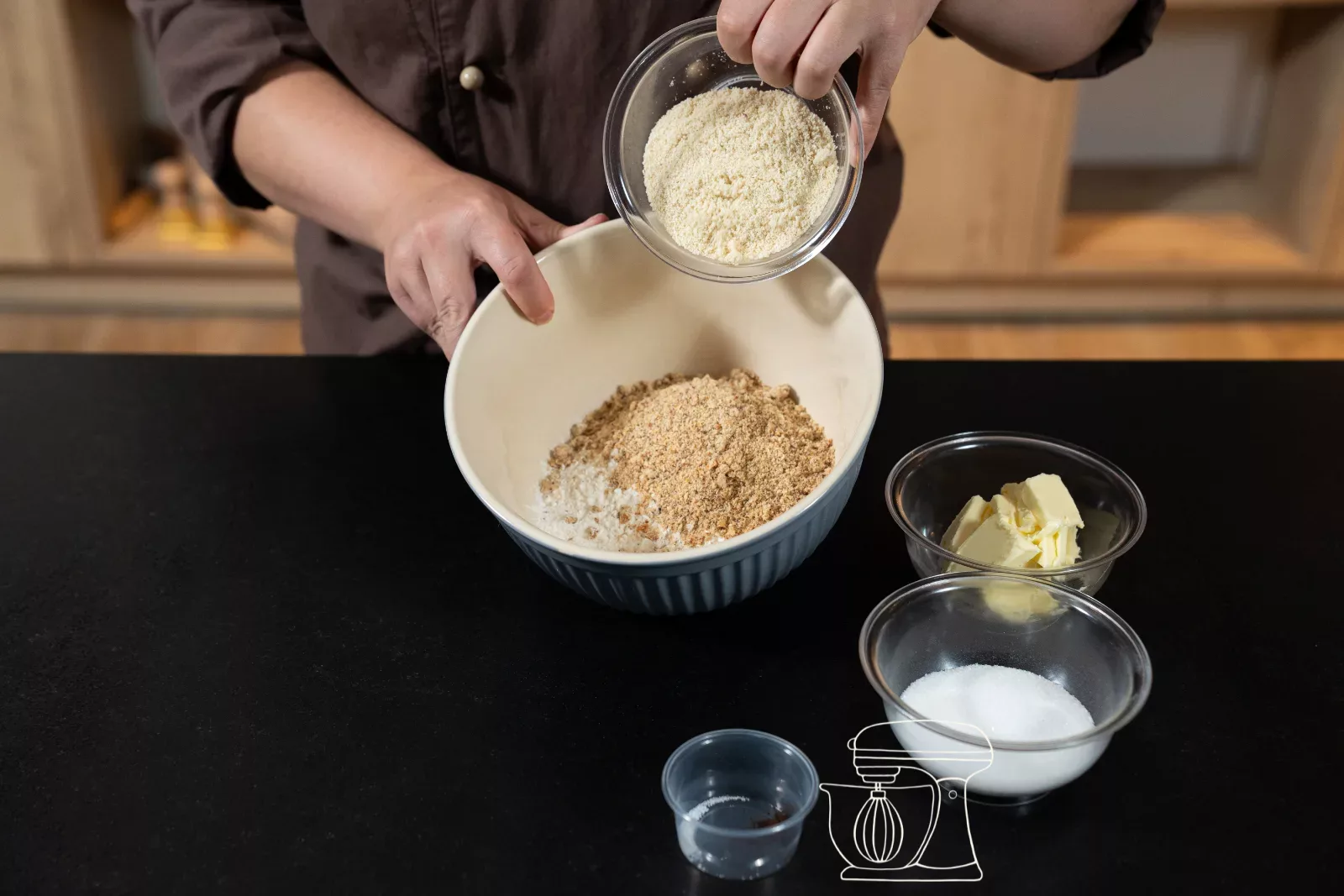 Ajouter les amandes moulues à la farine et aux noisettes
