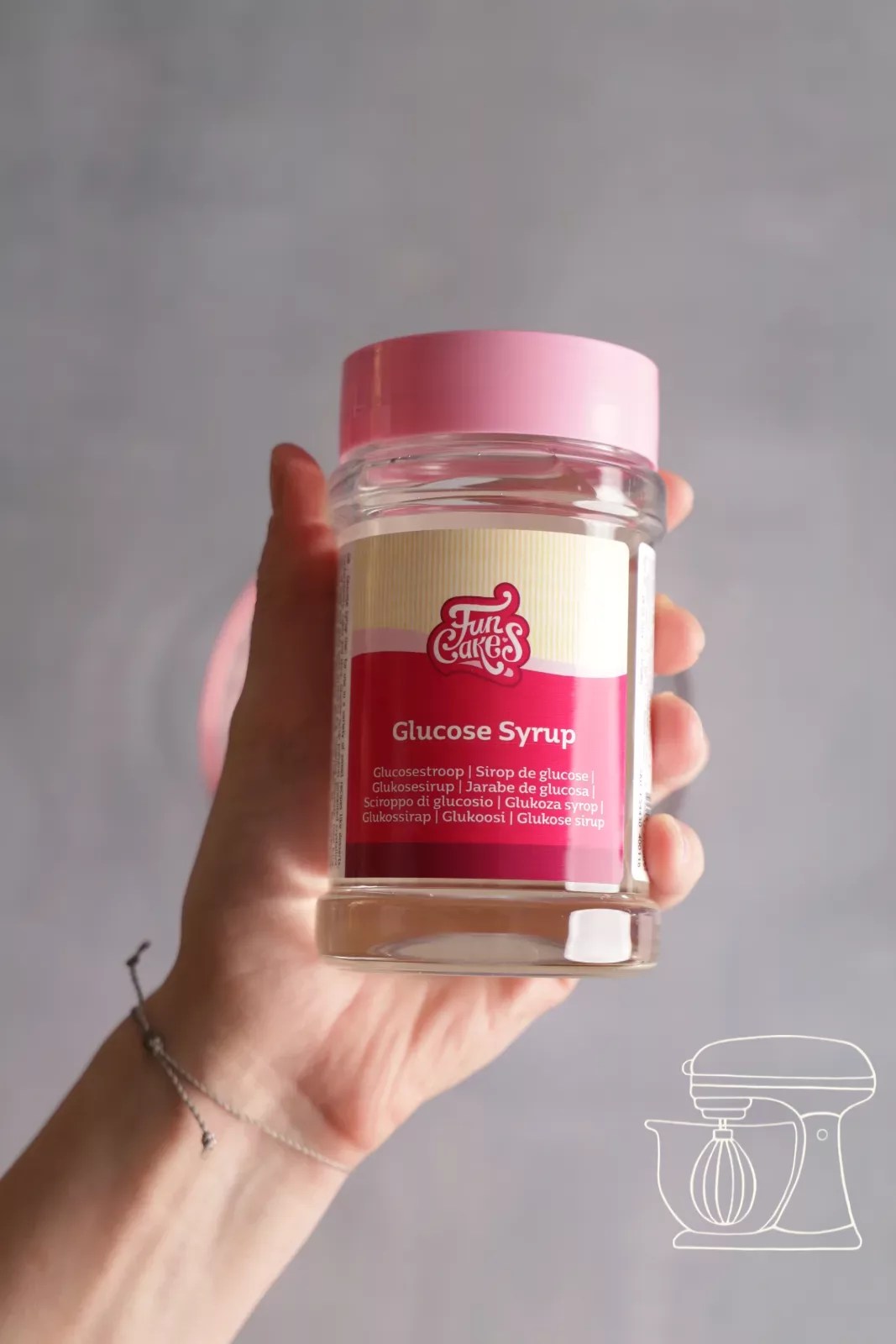 Glucose syrup is added to the bowl