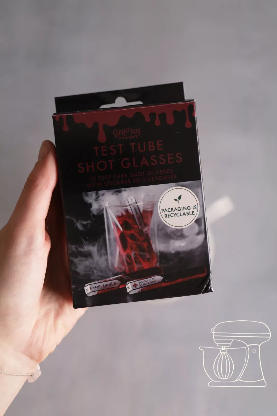 A test tube is filled with red fake blood
