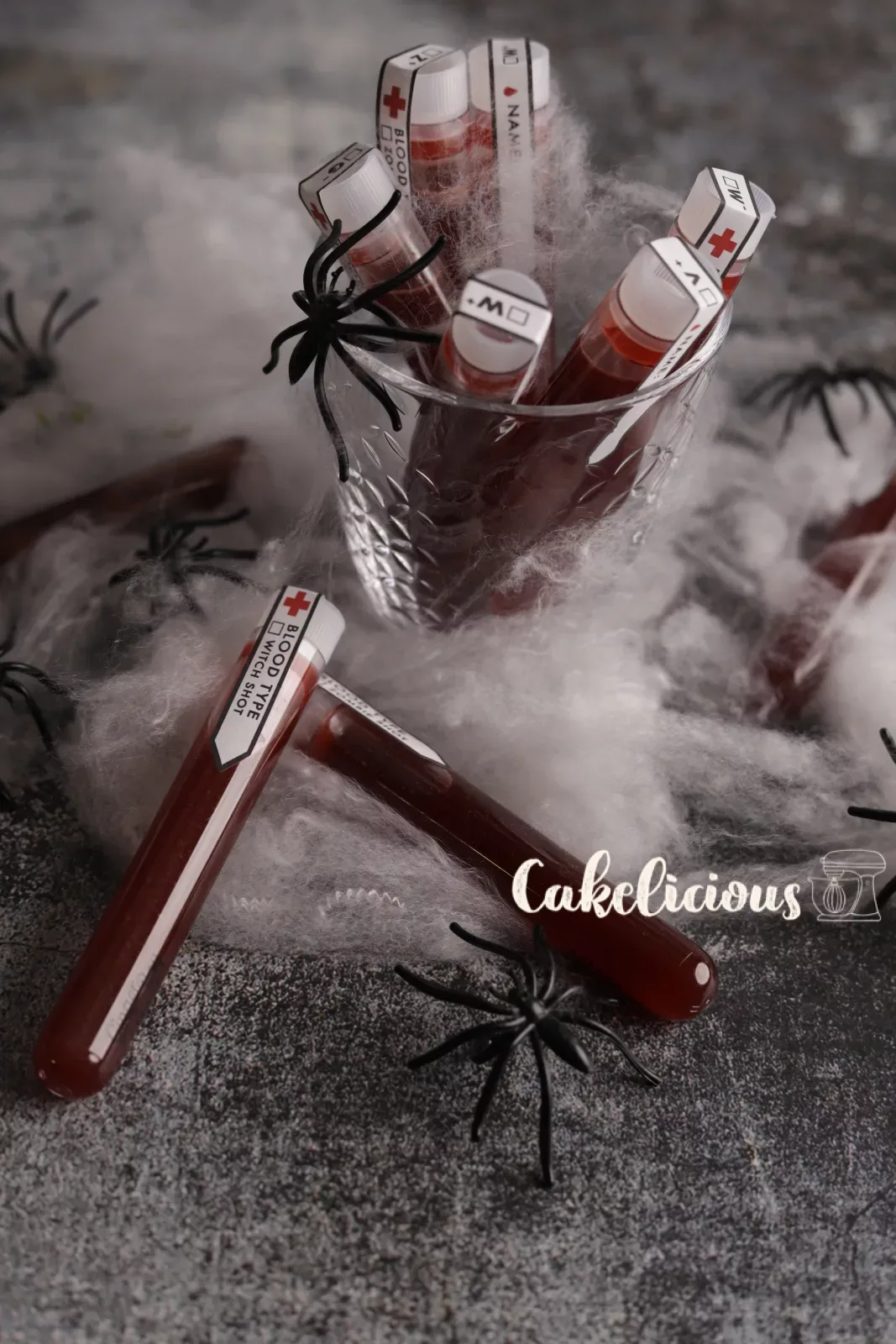 Blood sample shots in test tubes with red fake blood for the Halloween party