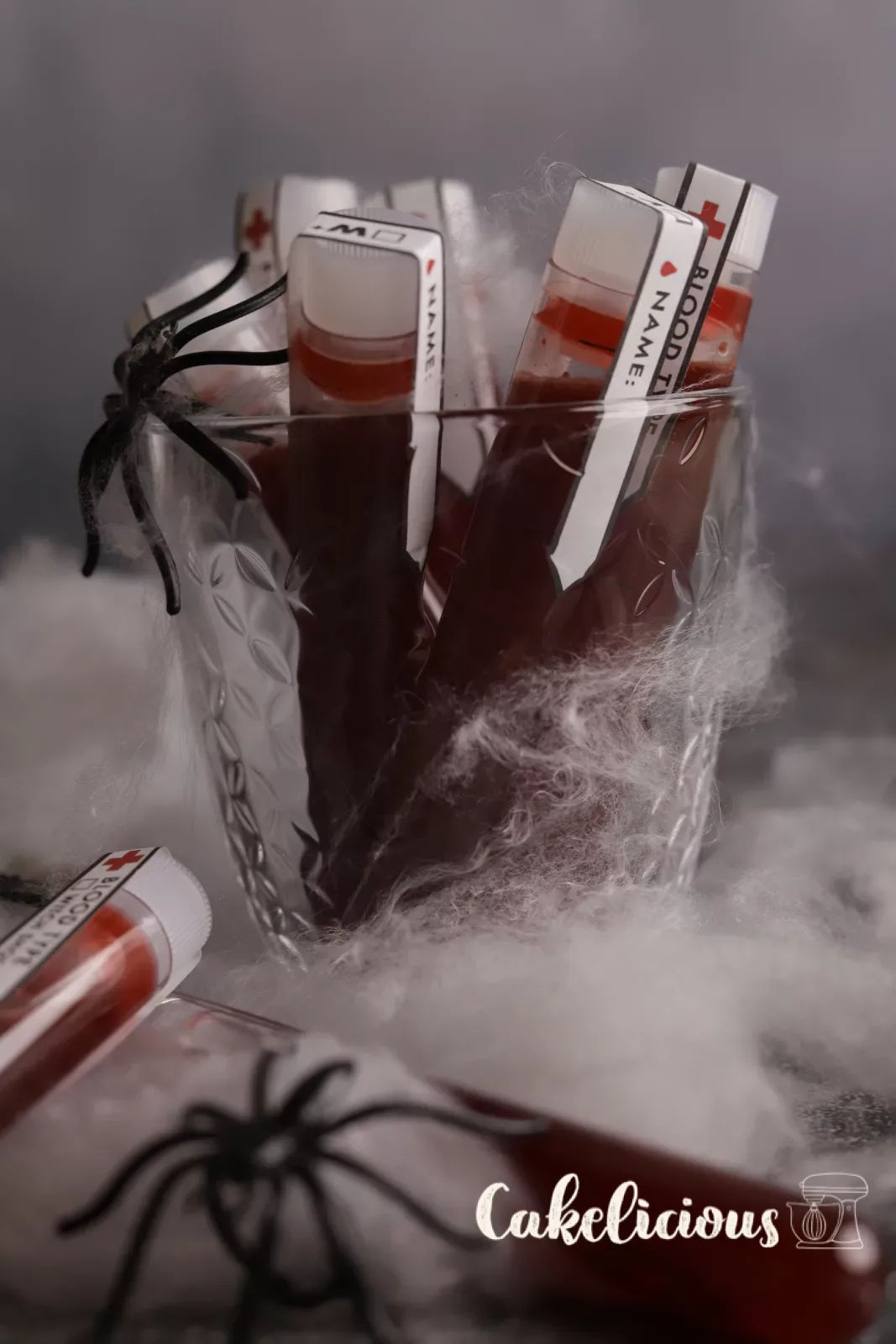 Blood sample shots in test tubes with red fake blood for the Halloween party