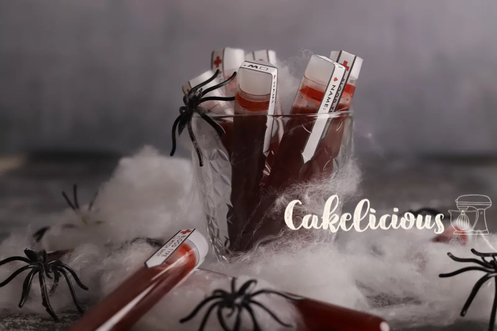 Blood sample shots in test tubes with red fake blood for the Halloween party