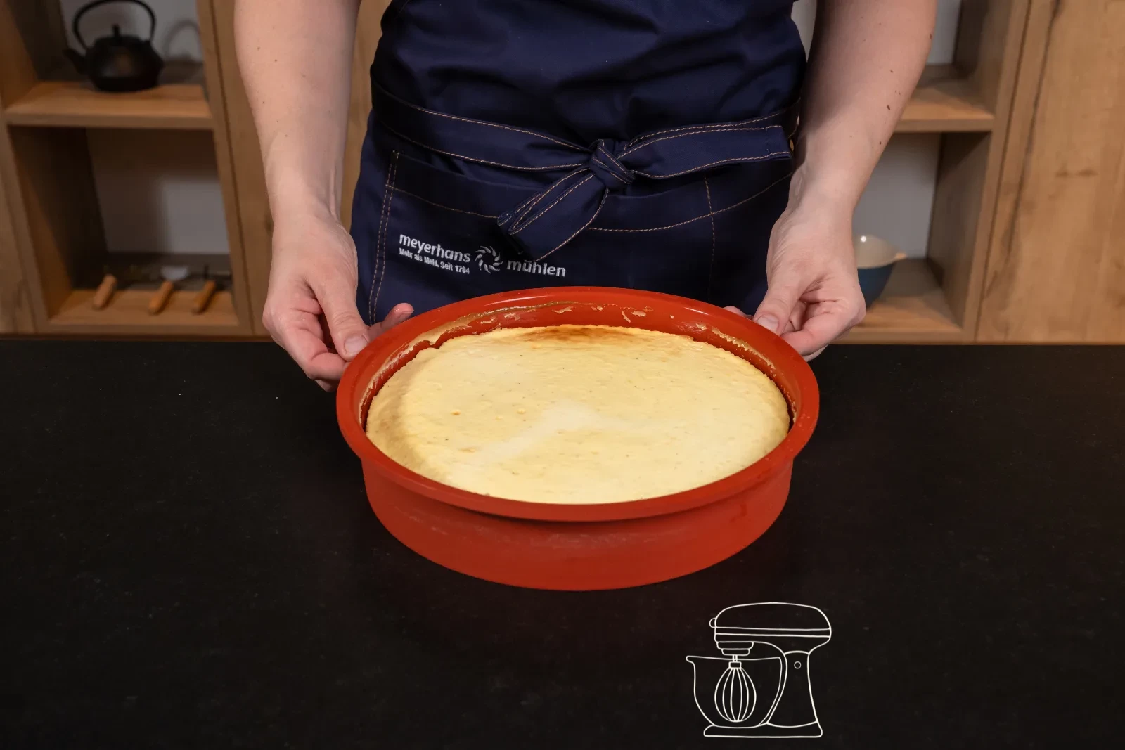 La cheesecake appena cotta nello Stampo in silicone rosso