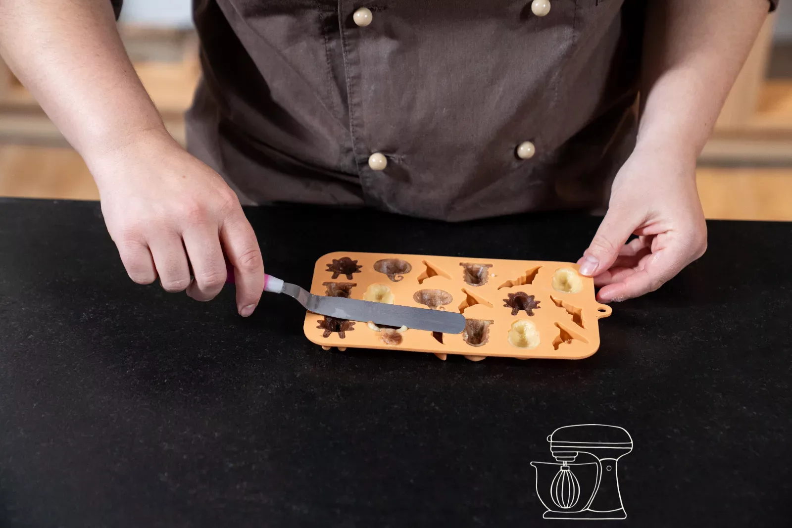 Scrape off excess dough with the angled Spreading palette