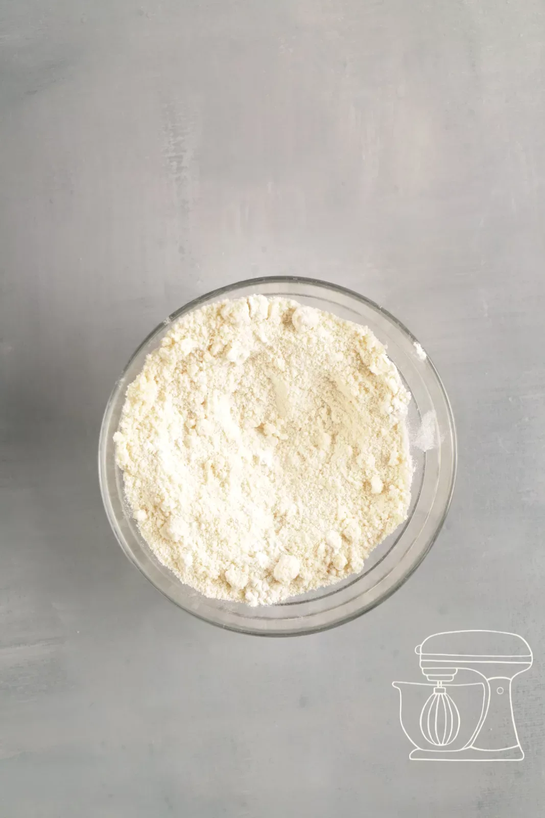 Dry ingredients being mixed with a spoon
