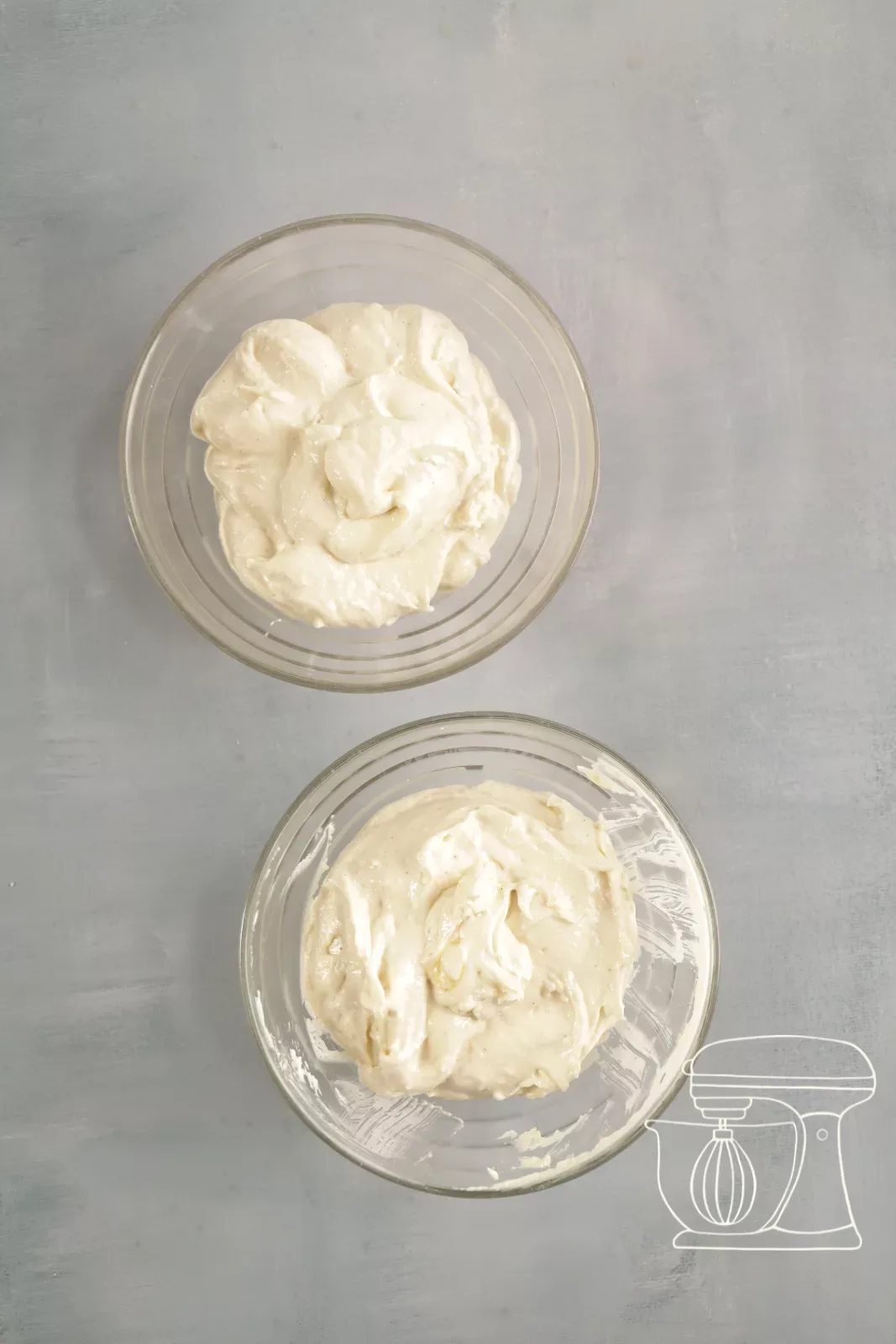Financier batter being divided between two bowls