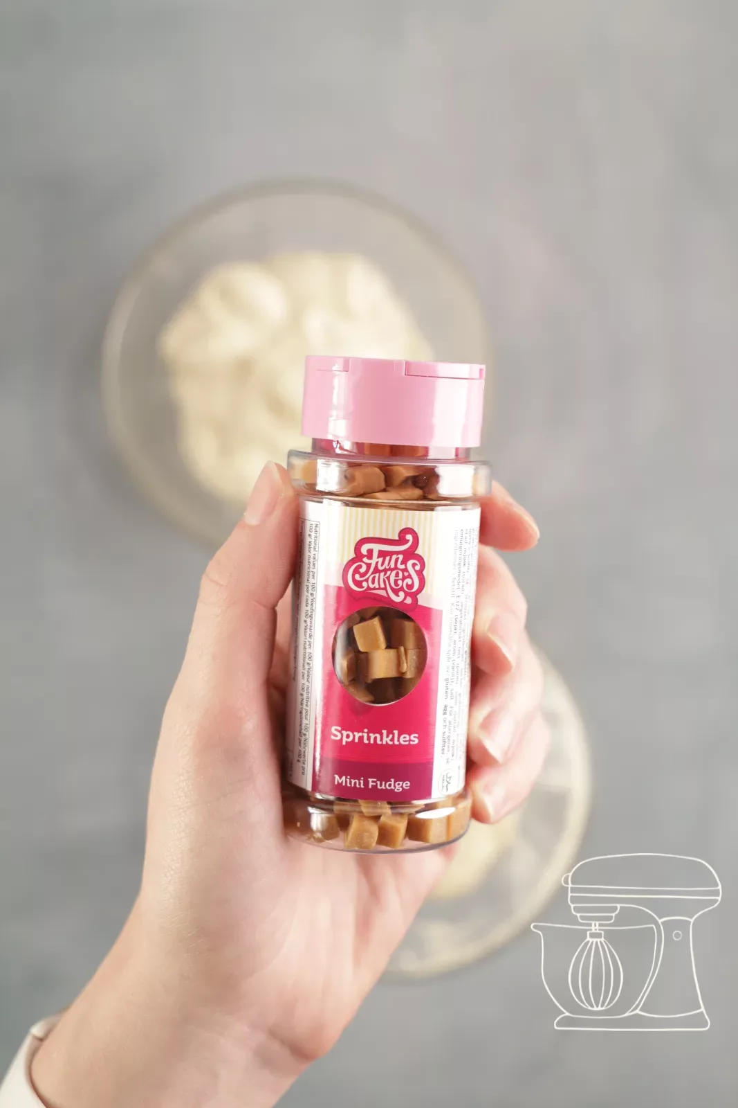 Mini Caramel chips being added to the Financier batter