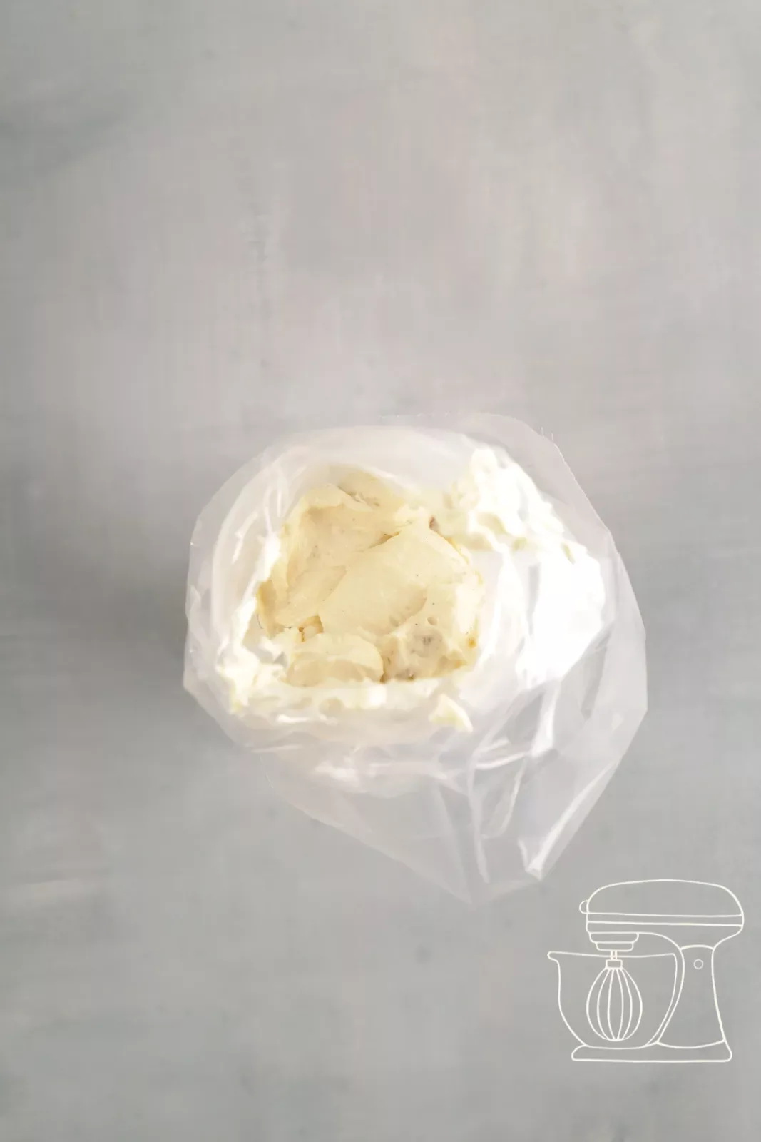 Financier batter being filled into the piping bag