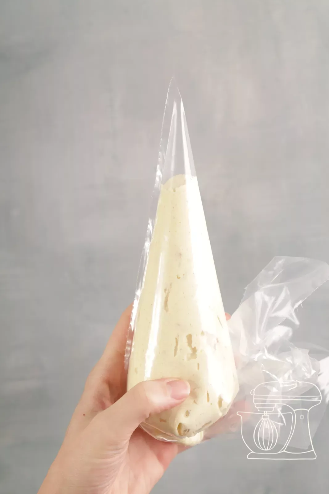 Two filled piping bags with caramel and chocolate batter