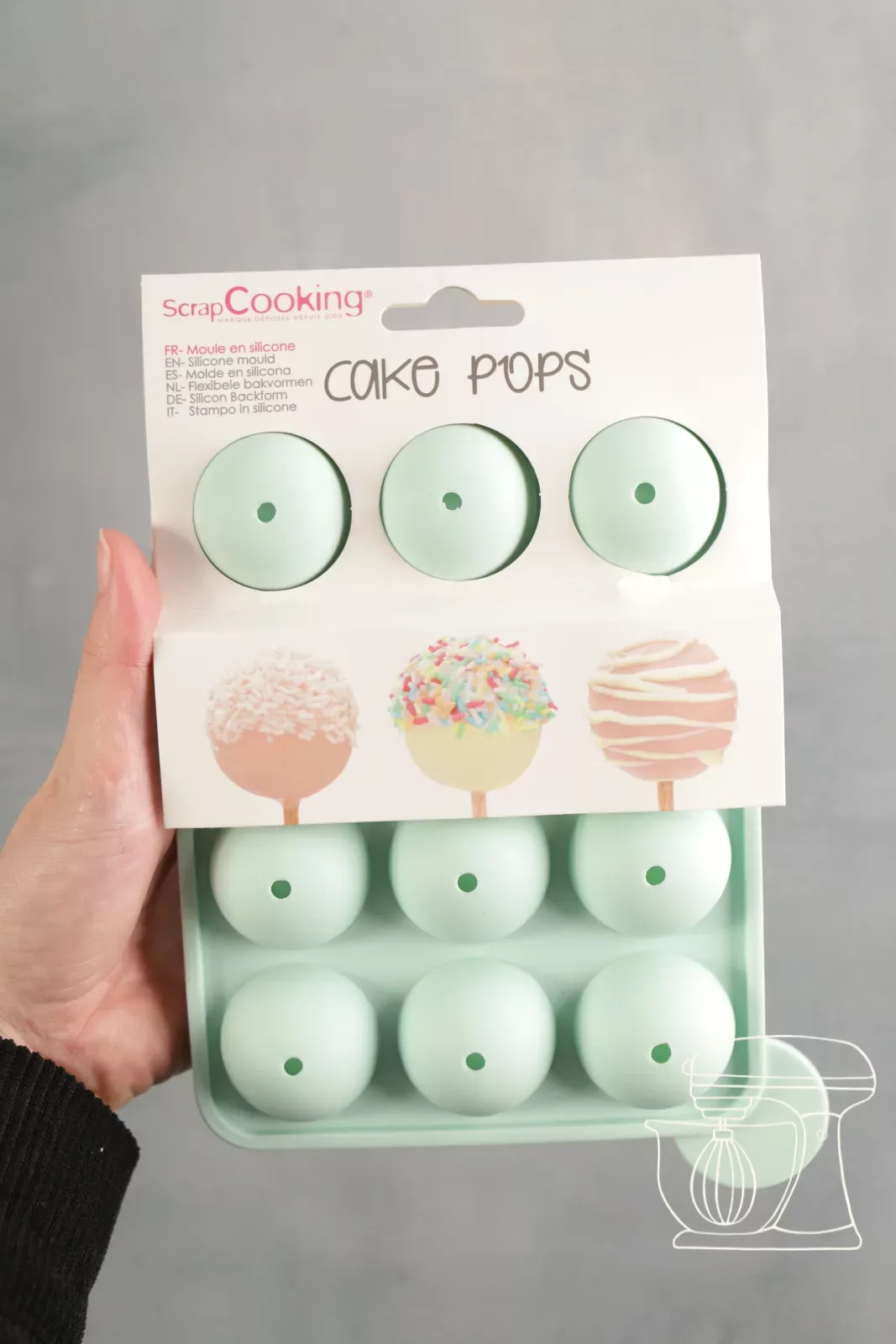 Lower part of the cake pop baking tin on a perforated tray