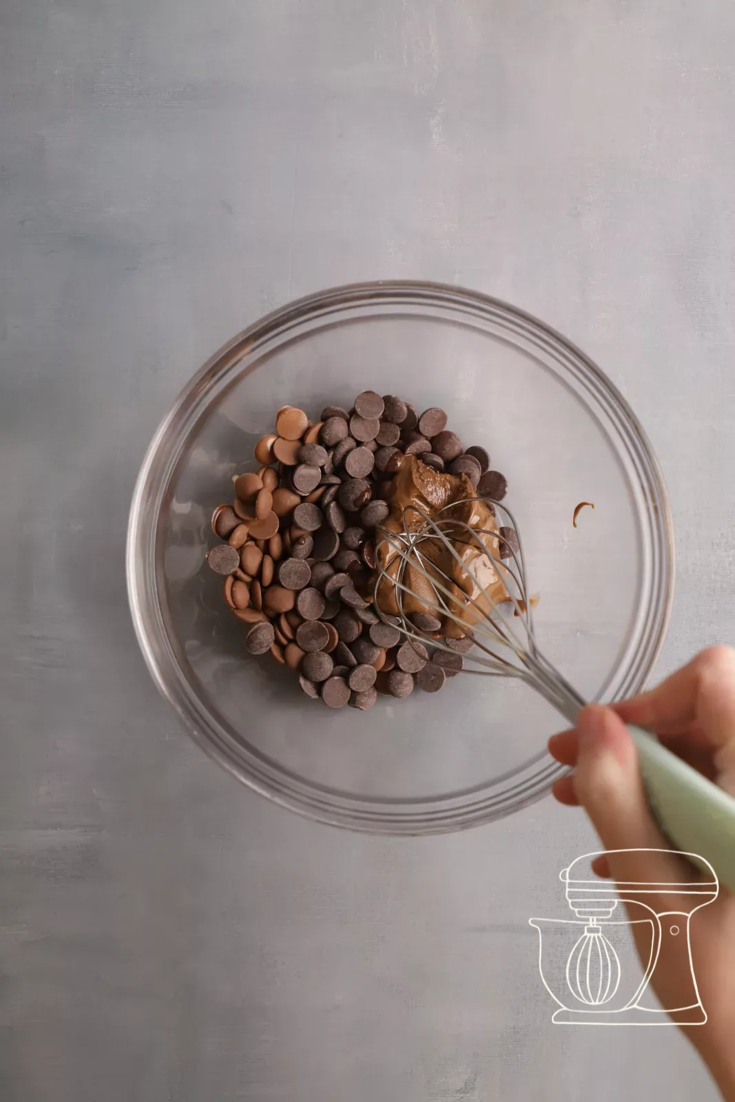 Chocolate praline mixture is melted in the microwave