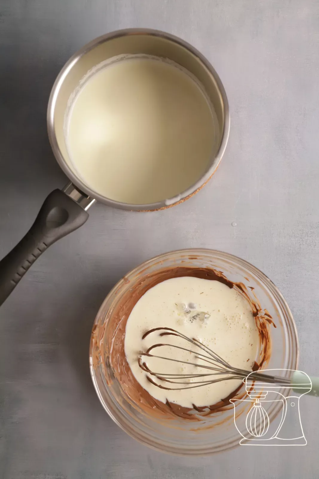 Hot cream is poured over the chocolate