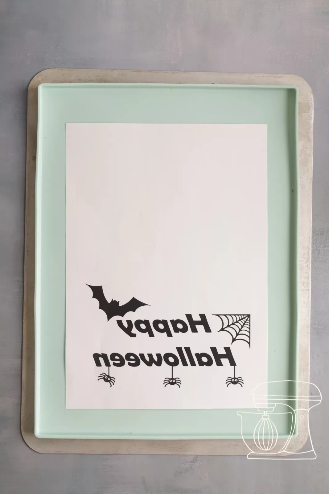 Mirror-reversed Halloween template under the mat