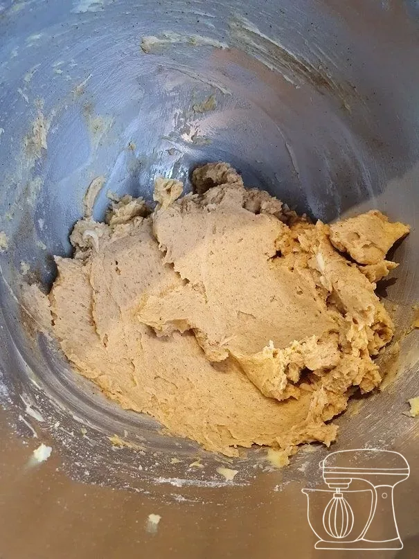 Spiced mixture being beaten with the Whisk