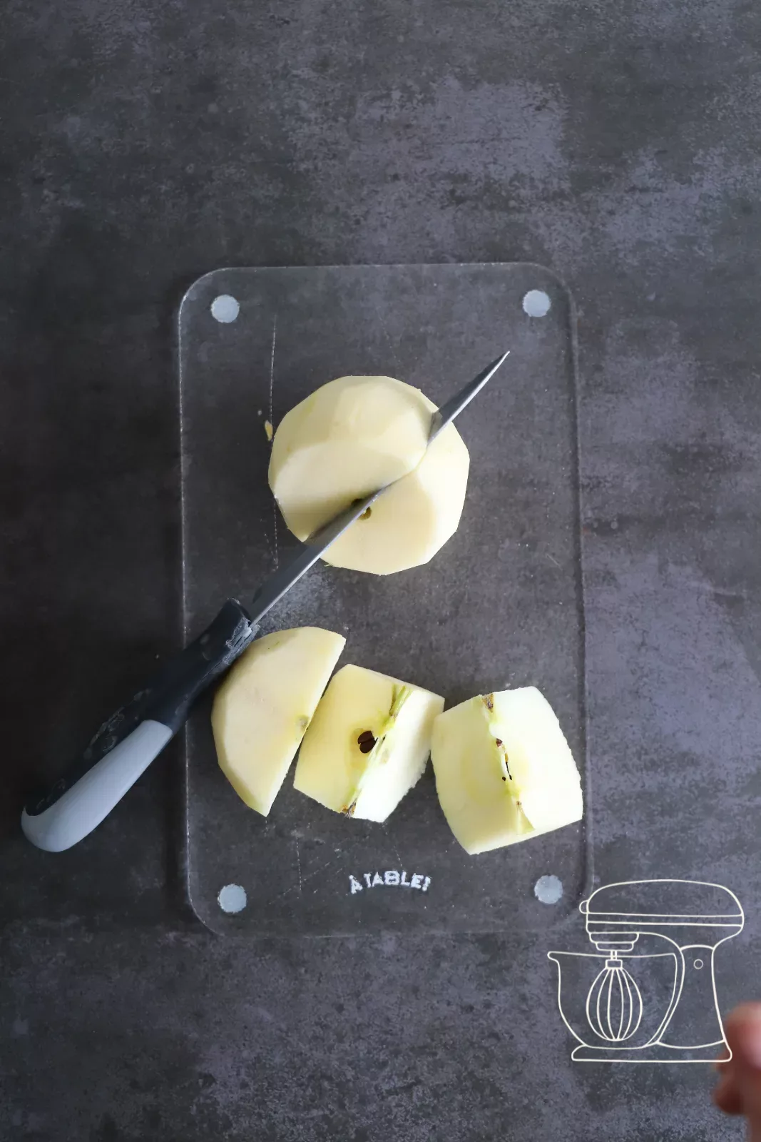 An apple being peeled