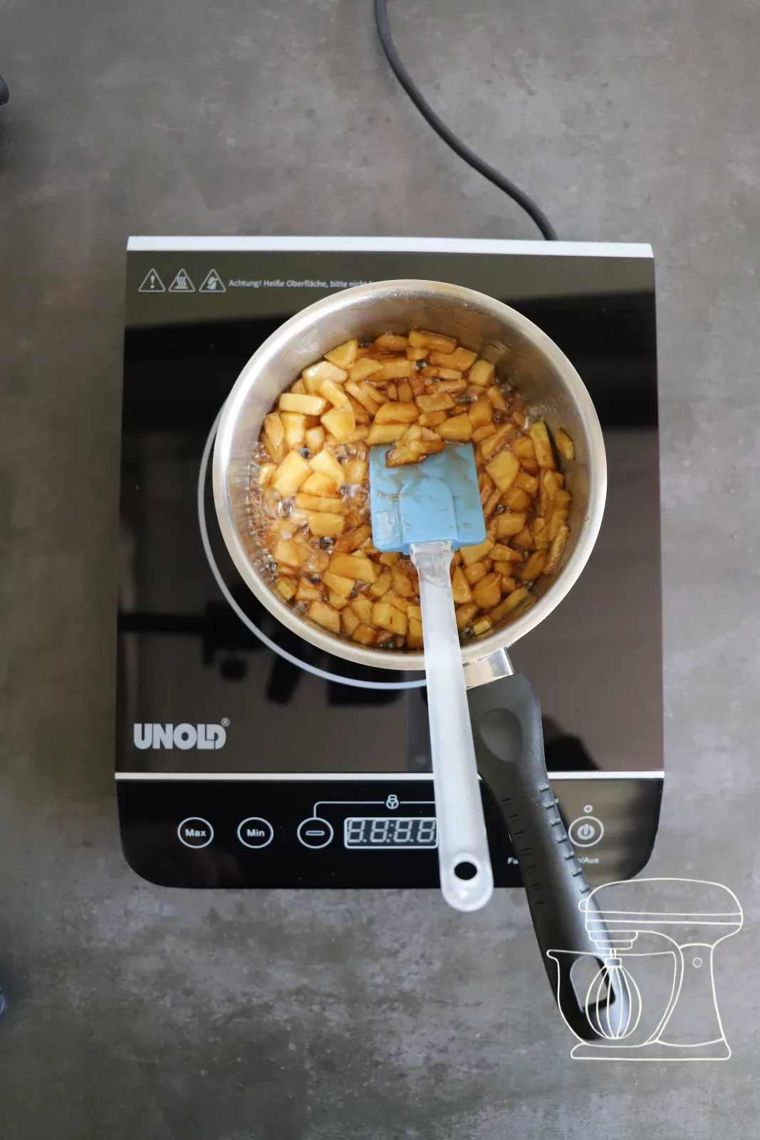 Apple and cinnamon filling being put into a Bowl