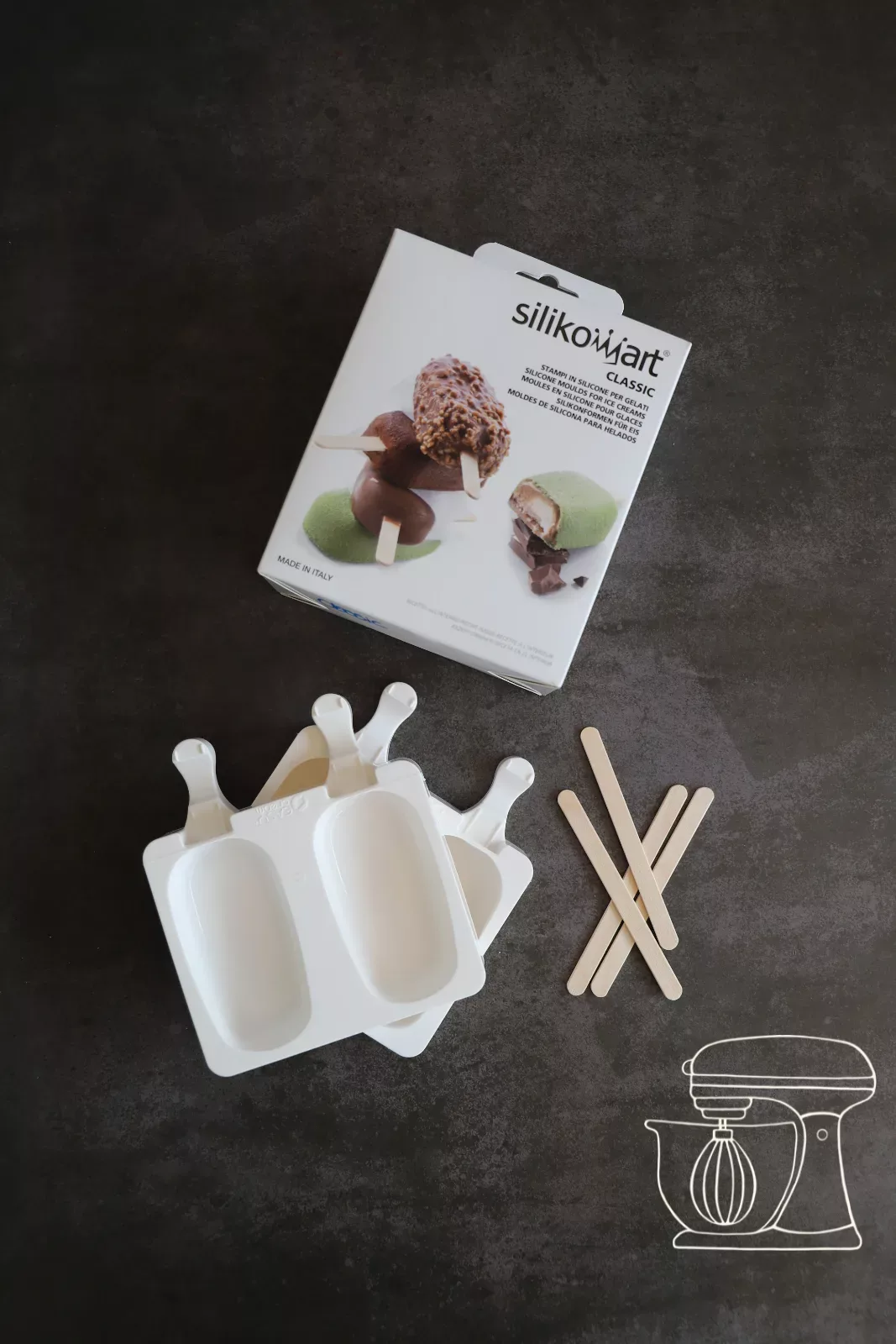 Cheesecake mixture being filled into the cakesicle mould
