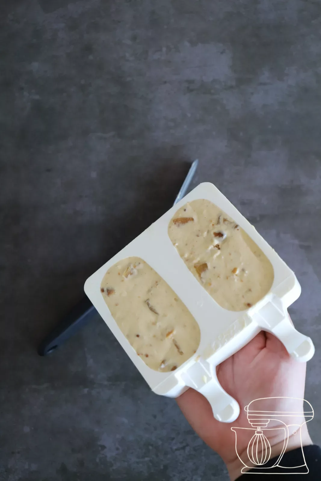 Wooden stick being pushed into the filled mould