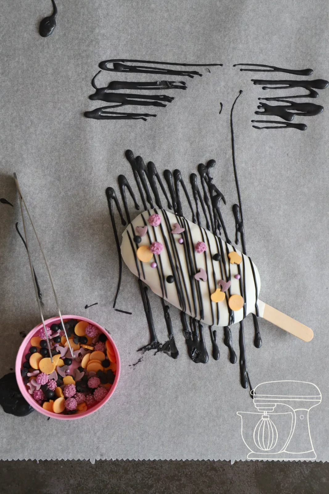 Cakesicle with colourful Halloween sprinkles