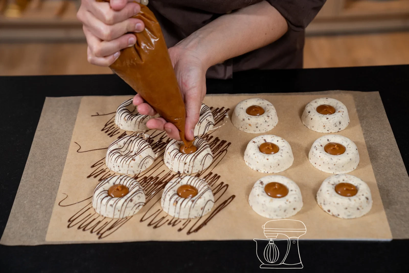 Unmoulded parfaits with caramel cream in the middle on baking paper