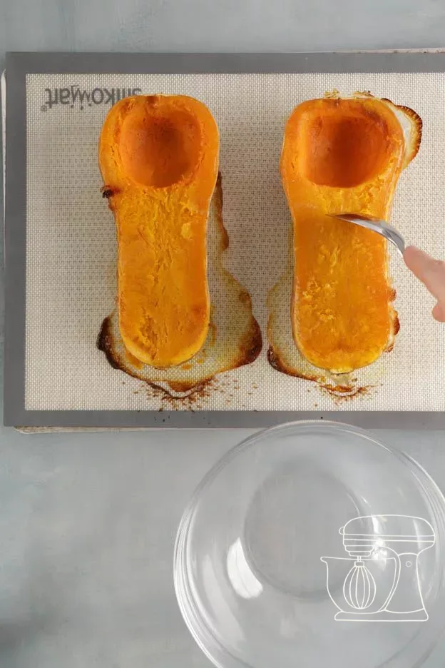 The flesh is scooped out with a spoon